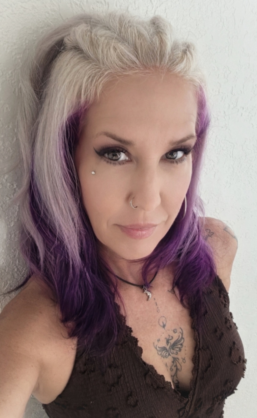 Kat Preston, founder and licensed barber behind Omni Shop Guardian